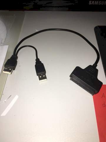How do I connect a 2.5 SATA hard disk to the PC using an adapter
