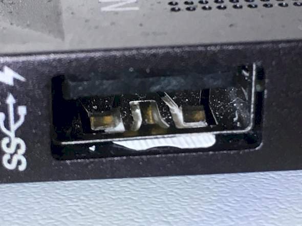 Something white in the USB port on my laptop