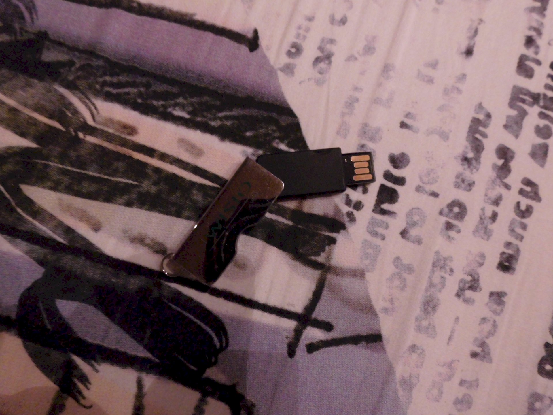 Where do I insert such a flat USB stick on the laptop photo