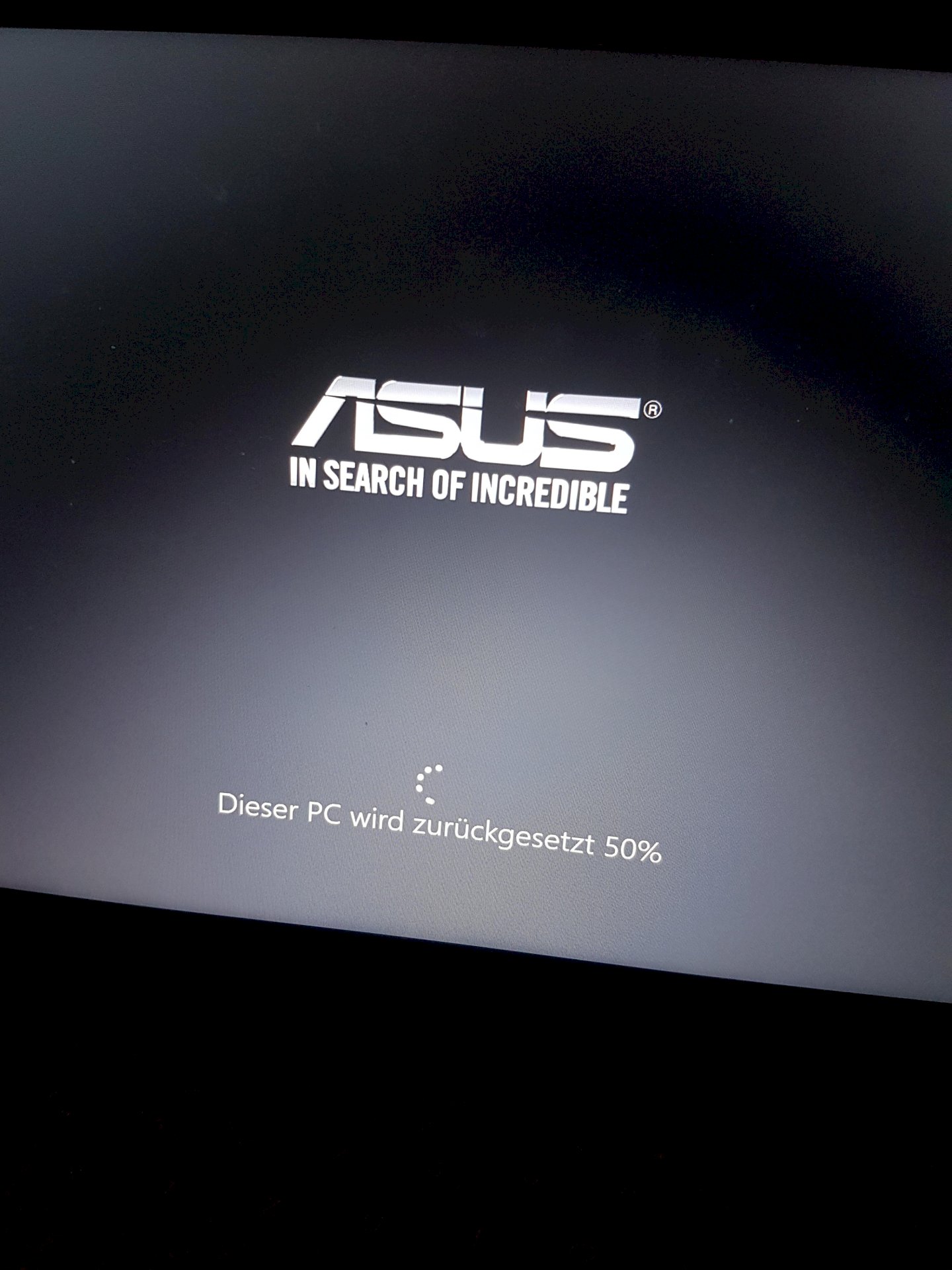 When resetting the laptop it sticks at 50 , what to do